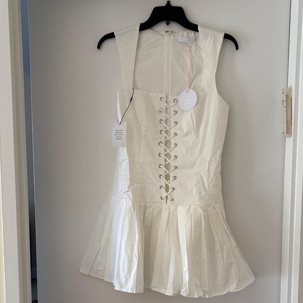 Brand New! Chic Cream Lace-Up Mini Dress
